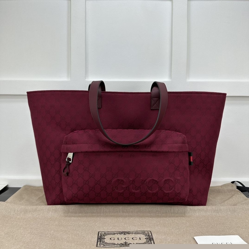 G*u*i shopping bags